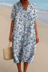Madeline™ | Ivory Dress Adorned with Porcelain Blue Floral Accents